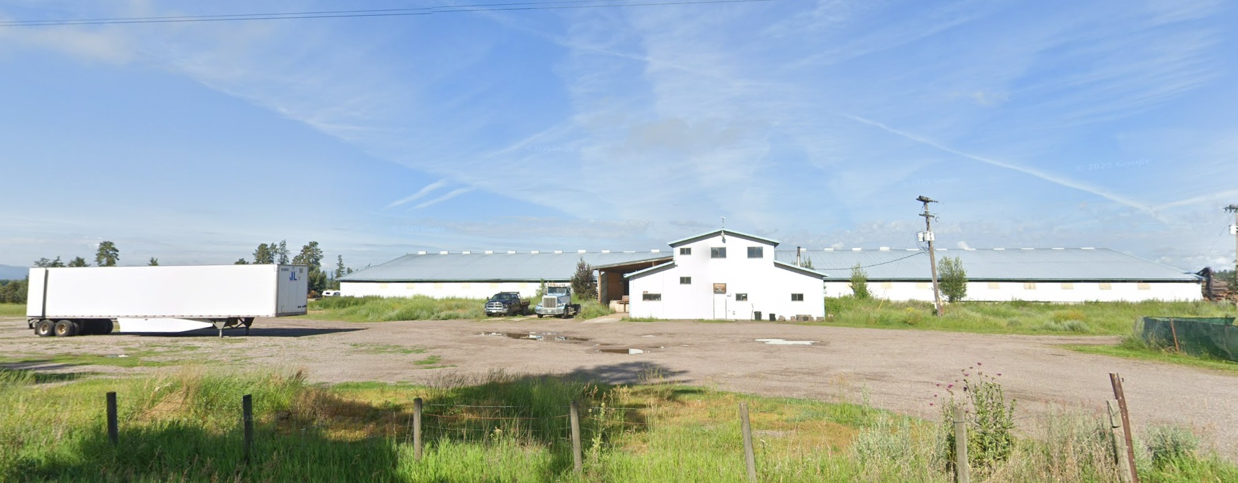 The Montana Timberline Firewood lot before the fire, showing the main building and yard